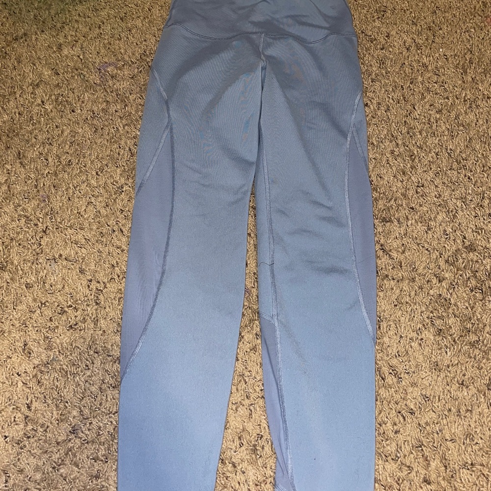 light blue athletic leggings with see through seams on legs!